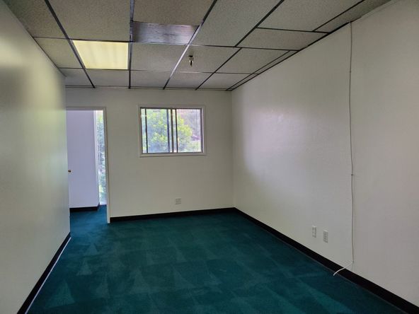 TWO OFFICES AND OPEN SPACE. SEVERAL USES. FOR LEASE BY OWNER.